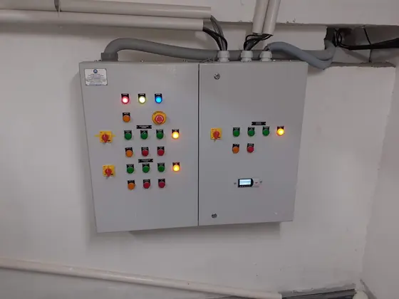 Wall mounted control panels with push buttons and lamps