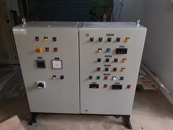 Two section control panel with push buttons and meters