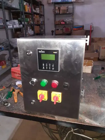 Stainless steel panel with digital controller and push buttons