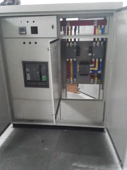 Open switchboard compartment with a breaker and busbars