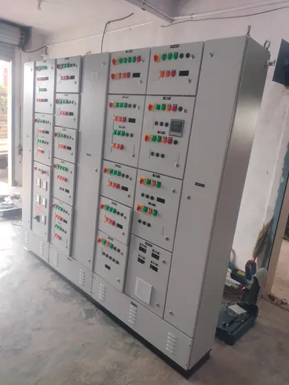 Row of floor standing MCC panels in the workshop