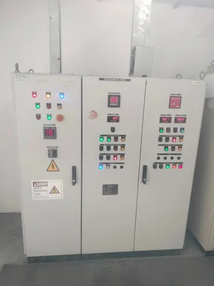 Three section control panel with warning label