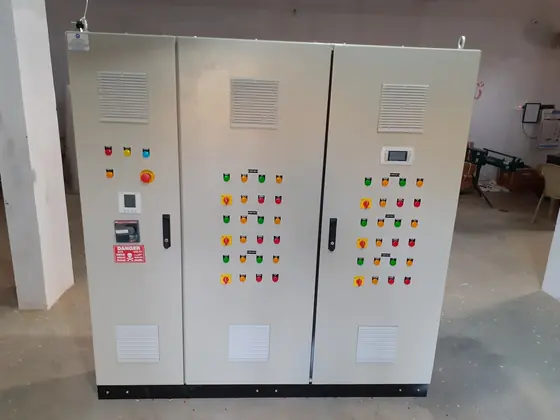 Three section control panel with ventilation grilles