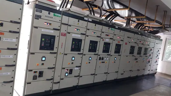 Long line of switchgear panels with circuit breakers