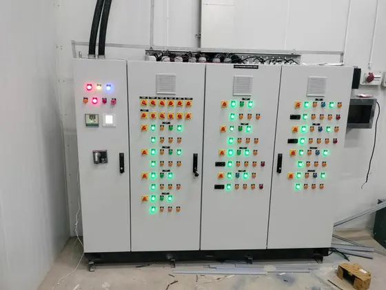 Three bay control panel under test with lit indicators