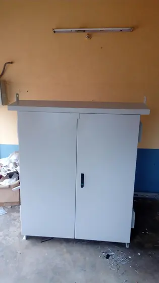 Weatherproof panel enclosure with a canopy
