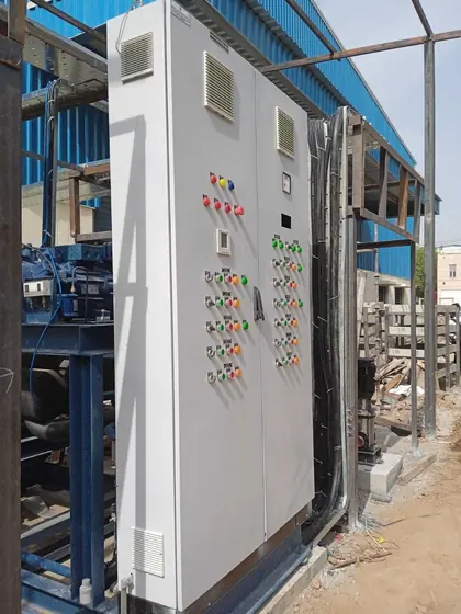 Panel installed beside plant equipment at a site