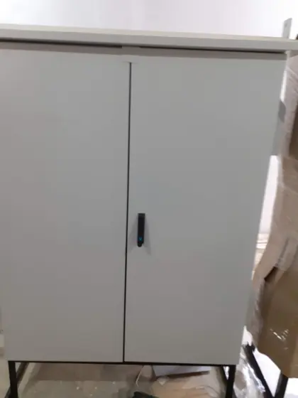 Large two door panel enclosure on a base frame