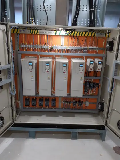 VFD panel interior with five drives and wiring